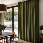 Olive Green Velvet S-Fold Blackout Curtains for Sliding Doors in a Dining Room with Off-White Walls