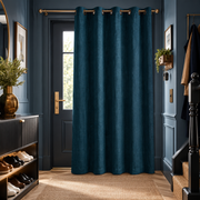 Thermal Door Curtains in a Hallway with Dark Blue Walls and a Black Console Table