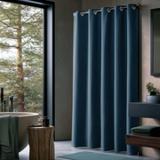 Peacock Blue Linen Hookless Weighted Shower Curtain in a Modern Spa Interior with a Rustic Wooden Stool