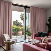 Pink Velvet S-Fold Blackout Curtains for Bifold Doors in a Living Room with Light Grey Walls