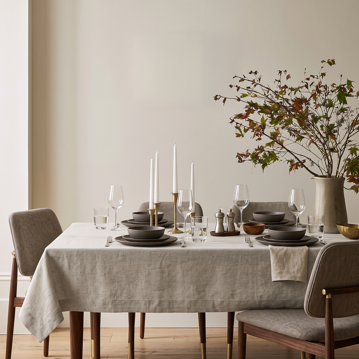 Natural Rectangular Linen Tablecloth in a Contemporary Dining Room with Walnut Chairs