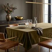 Olive Brown Rectangular Velvet Tablecloth in a Contemporary Dining Room with Cognac Leather Chairs