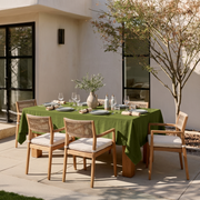 Moss Green Rectangular Linen Tablecloth on a Contemporary Outdoor Patio with Woven Chairs