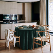 Hunter Green Velvet Round Tablecloth in a Modern Kitchen with Light Wood Cabinets