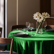 Lime Green Round Velvet Tablecloth in an Elegant Dining Room with Dark Wood Furniture and White Flowers