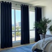 Royal Blue Linen Eyelet Curtains in a Bright Modern Bedroom with Cool Blue Accents - Cotton Lining