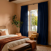 Royal Blue Linen Pencil Pleat Curtains in a Terracotta Bedroom - Cotton Lining