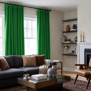 Lime Green Velvet S-Fold Curtains in a Contemporary Living Room with a Charcoal Sofa and a White Fireplace
