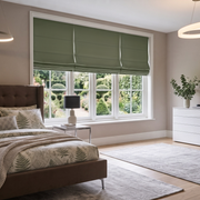 Sage Green Cordless Linen Roman Blinds in a Contemporary Bedroom with Taupe Walls and Brown Upholstered Bed