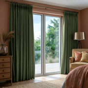 Sage Green Linen Pinch Pleat Curtains for Bifold Doors in a Bedroom with Warm Brown Walls - Blackout Lining