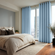 Sky Blue Linen Eyelet Bedroom Curtains in a Calm Minimal Bedroom with Soft Grey Blue Walls and Charcoal Accents - Blackout Lining