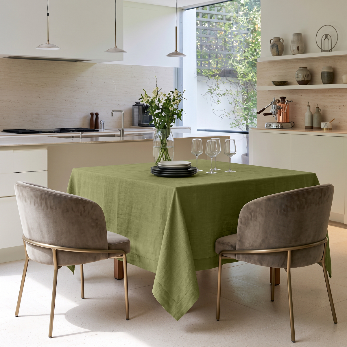 Olive Green Square Linen Tablecloth in a Modern Kitchen with Cream Cabinetry and Upholstered Dining Chairs
