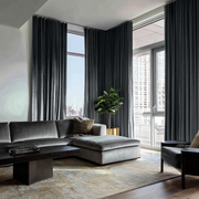 Steel Black Velvet Multitape Thermal Curtains in a Contemporary Living Room with a Grey Sectional