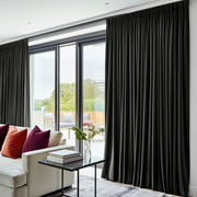 Steel Black Velvet Pencil Pleat Blackout Curtains for Sliding Doors in a Living Room with Bright White Walls