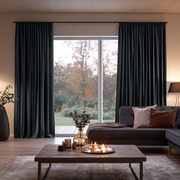 Steel Black Velvet Pencil Pleat Extra Long Curtains in a Contemporary Living Room with Sectional Sofa and Warm Ambient Lighting