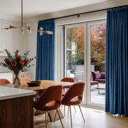Steel Blue Velvet Pencil Pleat Blackout Curtains for Sliding Doors in a Kitchen with Off-White Walls