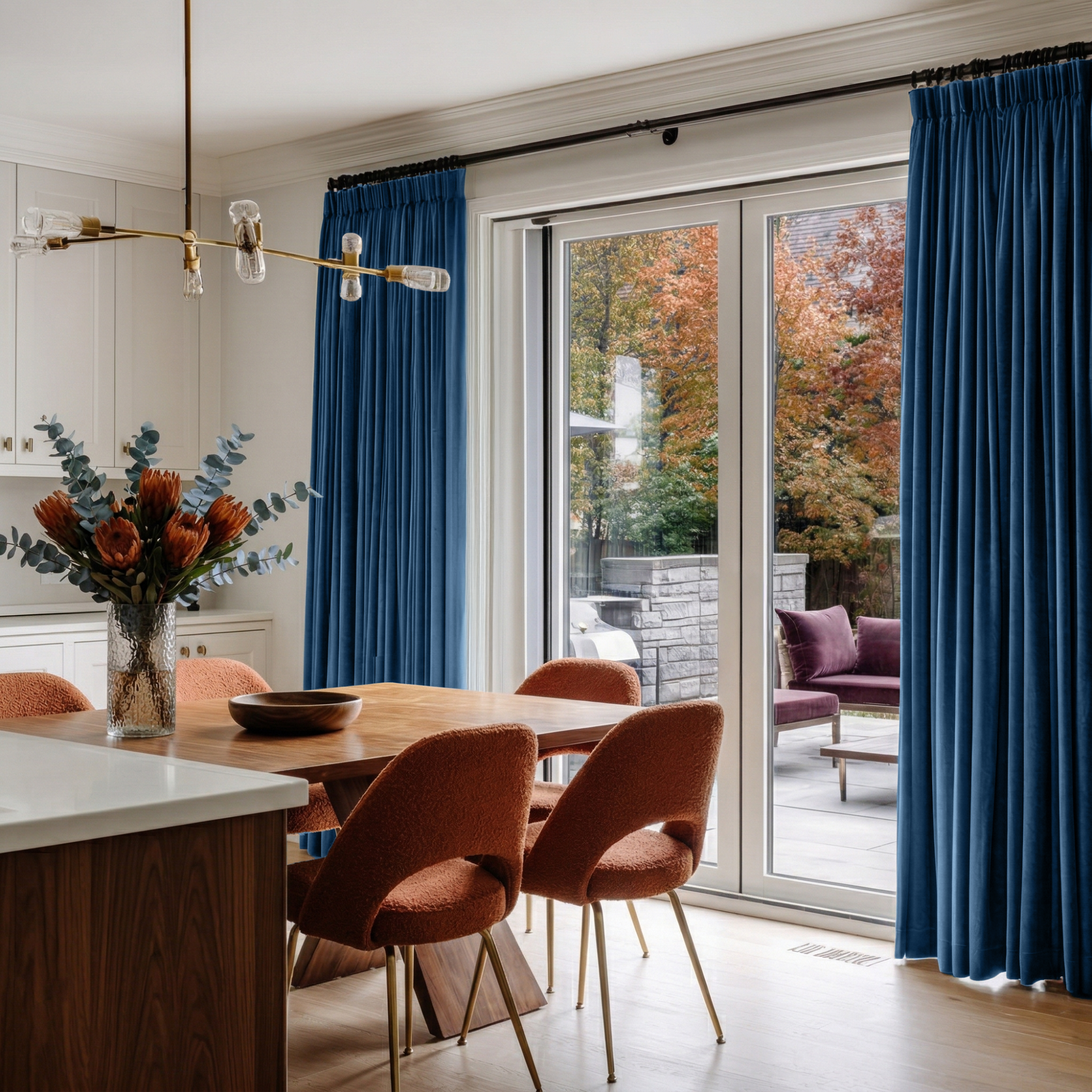 Steel Blue Velvet Pencil Pleat Blackout Curtains for Sliding Doors in a Kitchen with Off-White Walls