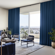 Steel Blue Velvet S-Fold Curtains for Sliding Door in a Contemporary Living Room