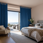 Steel Blue Velvet Tab Top Blackout Curtains in a Bedroom with Blush Pink Walls