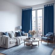Steel Blue Velvet Tab Top Blackout Curtains in a Living Room with Crisp White Walls
