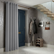 Stone Grey Thermal Door Curtain in a Hallway with Silver Foil Wallpaper and a Dark Blue Front Door