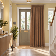 Thermal Door Curtains in a Hallway with Soft Yellow Walls and a Sage Green Door