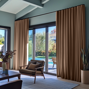 Tawny Brown Linen S-Fold Curtains for Bifold Doors in a Living Room with Blue Walls - Cotton Lining