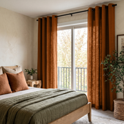 Terracotta Heavy Weight Linen Eyelet Curtains for Sliding Door in a Cozy Bedroom with Cream Walls and Sage Green Bedding