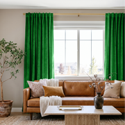 Lime Green Velvet Back Tab Curtains in a Modern Living Room with Beige Walls and a Caramel Leather Sofa