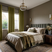 Moss Green Velvet Back Tab Curtains in an Elegant Bedroom with Taupe Walls and Ivory Bedding