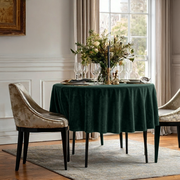 Hunter Green Velvet Round Tablecloth in an Elegant Dining Room with White Paneled Walls