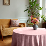 Pink Velvet Round Tablecloth in a Bright Living Room with Pale Green Walls