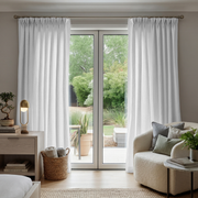 White Linen Pinch Pleat Curtains for Bifold Doors in a Living Room with Light Grey Walls - Cotton Lining